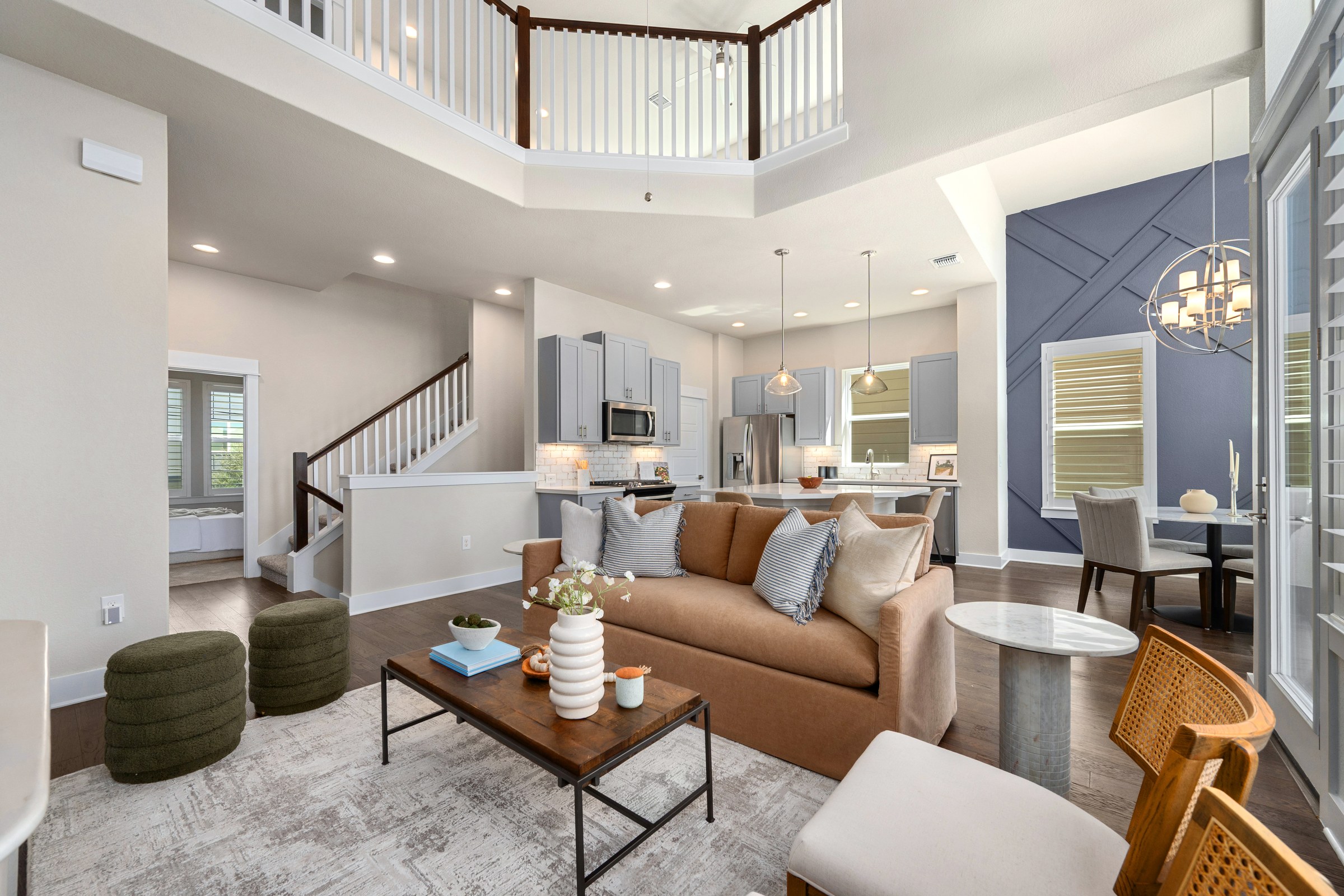 Open main living room with soaring ceiling