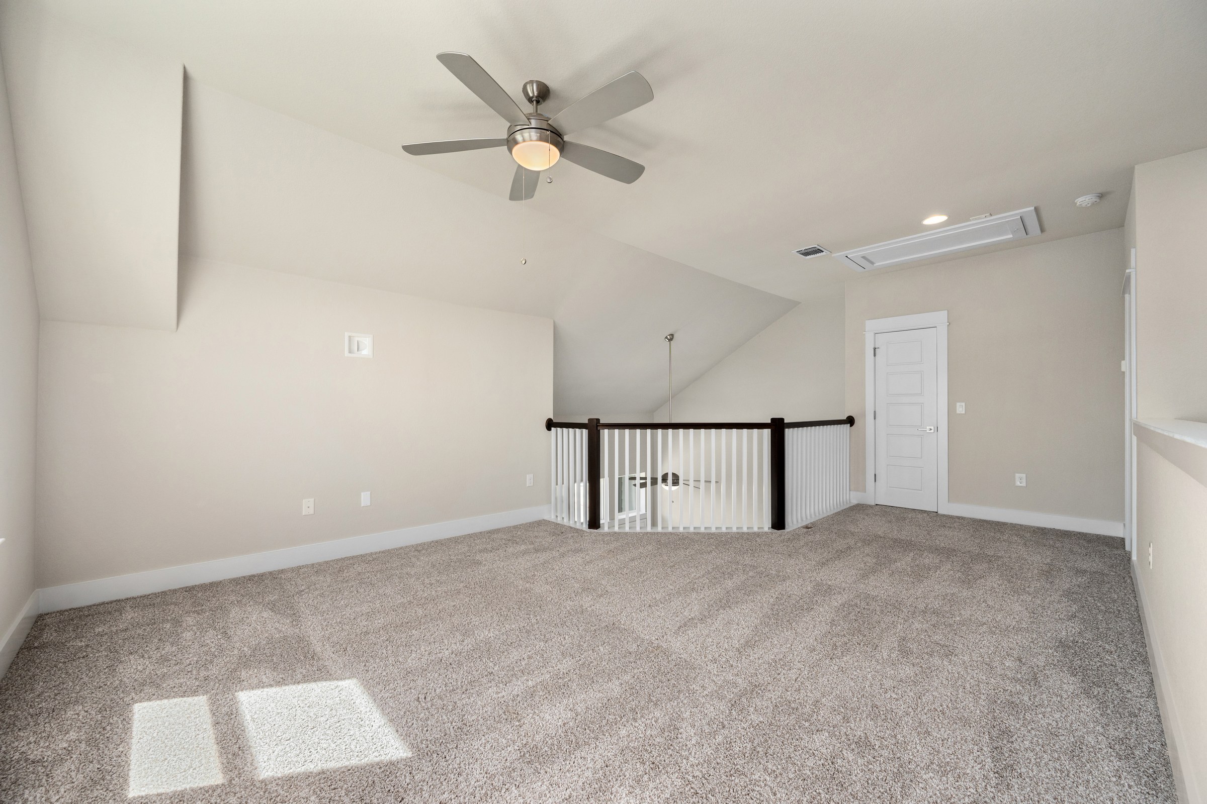 Top-floor flex room with open sightlines