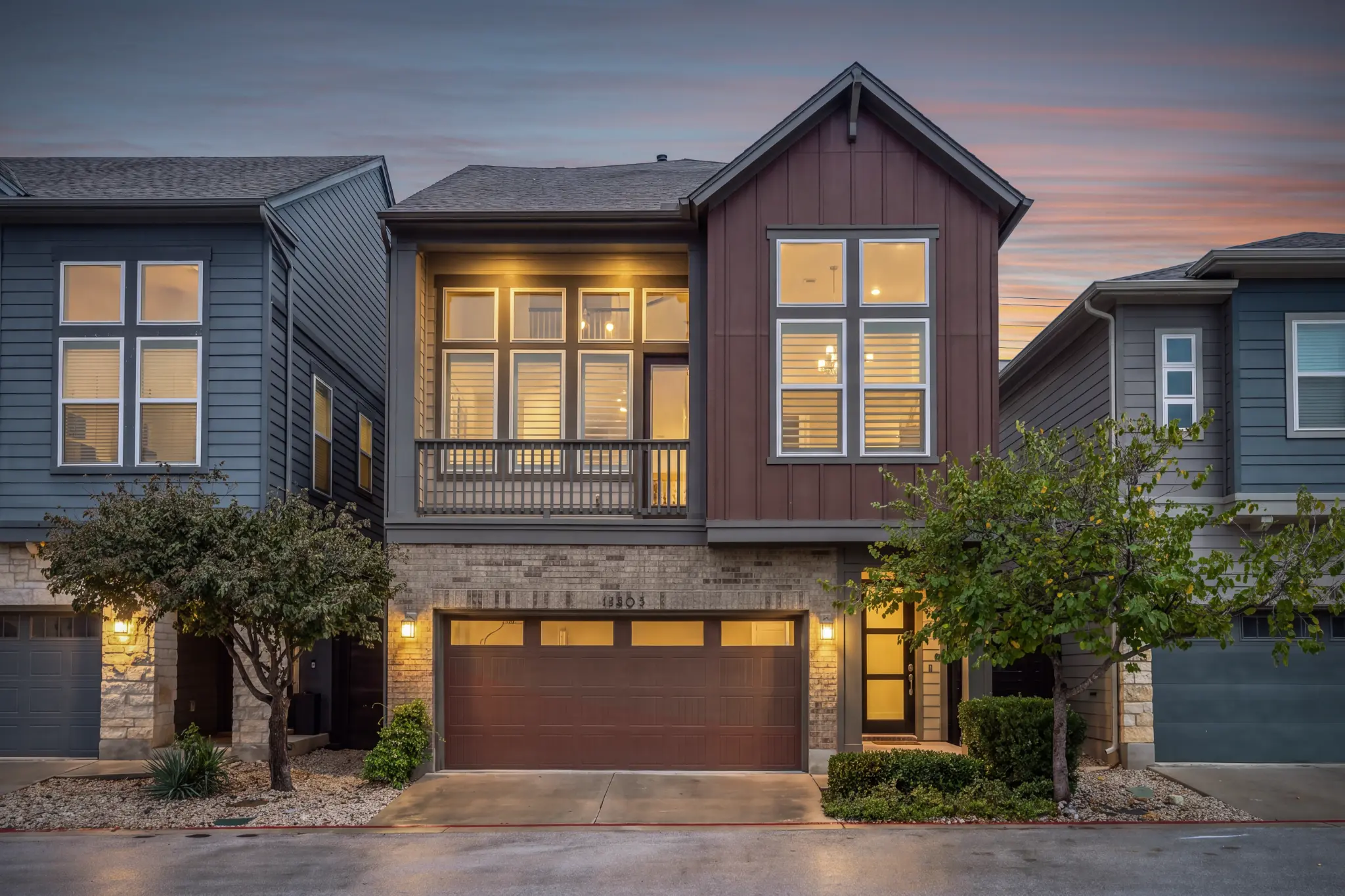 Twilight front exterior of 13805 Zink Bend